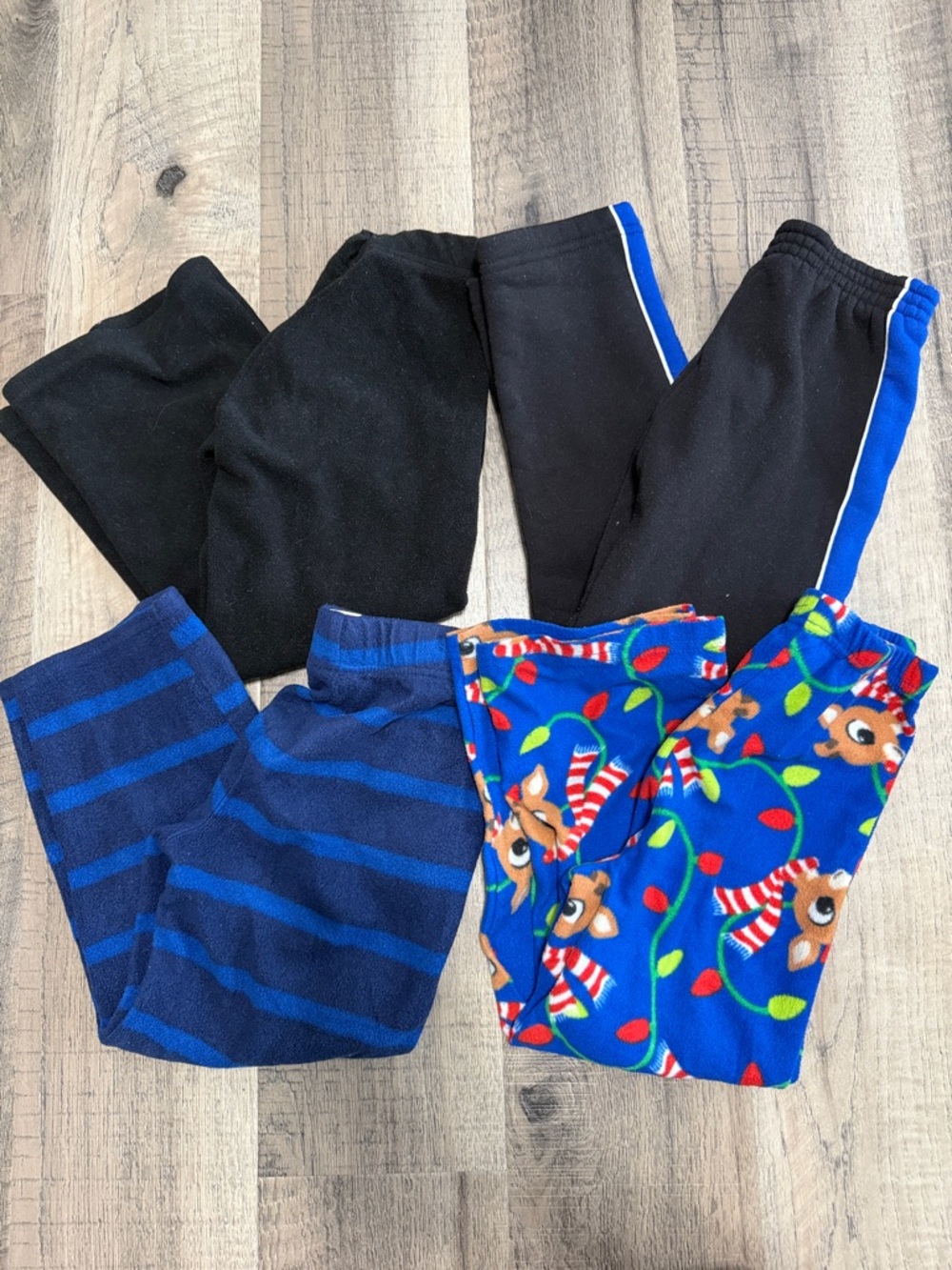 Lot of 4 Kids Fleece Pants - Black, Royal Blue, Patterned Blue and Christmas PJ